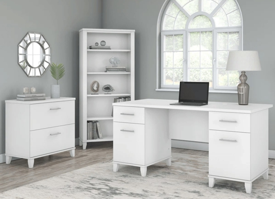 Office desk with 2 file drawers and 5 shelf bookcase space view white